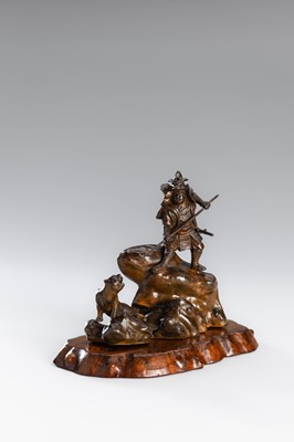 Lot 32 - A BRONZE OKIMONO OF A SAMURAI HUNTING A TIGER