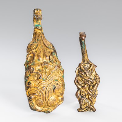 Lot 793 - TWO ARCHAISTIC GILT-BRONZE ‘MYTHICAL BEAST’ BELT HOOKS
