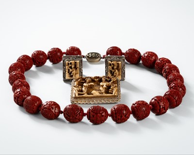 Lot 1018 - A SET OF SILVER AND BONE INLAID CUFFS, A BROOCH, AND A RED LACQUER NECKLACE, REPUBLIC PERIOD
