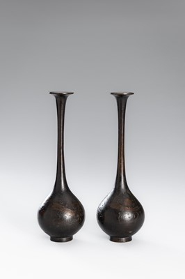 Lot 10 - A PAIR OF BRONZE TRUMPET BOTTLE VASES WITH DRAGONS AMONG CLOUDS