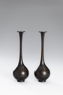 Lot 10 - A PAIR OF BRONZE TRUMPET BOTTLE VASES WITH DRAGONS AMONG CLOUDS