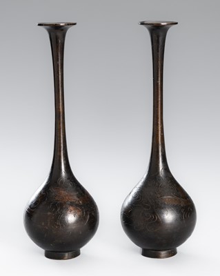 Lot 10 - A PAIR OF BRONZE TRUMPET BOTTLE VASES WITH DRAGONS AMONG CLOUDS
