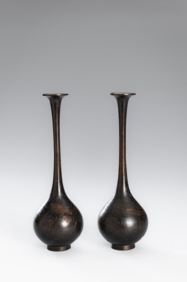 Lot 10 - A PAIR OF BRONZE TRUMPET BOTTLE VASES WITH DRAGONS AMONG CLOUDS
