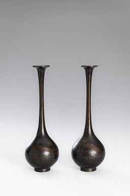 Lot 10 - A PAIR OF BRONZE TRUMPET BOTTLE VASES WITH DRAGONS AMONG CLOUDS