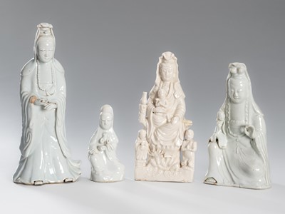 Lot 1182 - A GROUP OF FOUR DEHUA PORCELAIN FIGURES OF GUANYIN, LATE 19TH TO EARLY 20TH CENTURY
