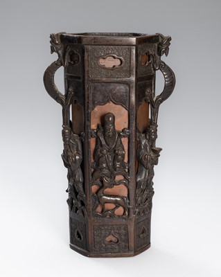 Lot 787 - A RETICULATED BRONZE ‘DAOIST IMMORTALS’ VASE, QING DYNASTY