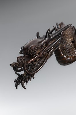 Lot 30 - A BRONZE KORO COVER WITH A DRAGON AMID CRASHING WAVES