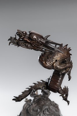 Lot 30 - A BRONZE KORO COVER WITH A DRAGON AMID CRASHING WAVES