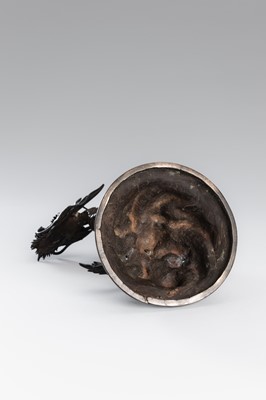 Lot 30 - A BRONZE KORO COVER WITH A DRAGON AMID CRASHING WAVES