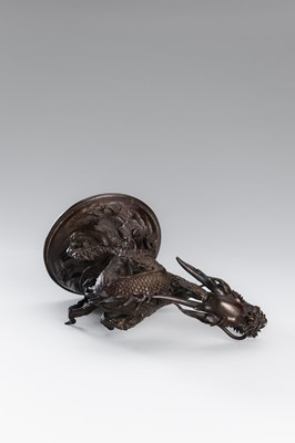 Lot 30 - A BRONZE KORO COVER WITH A DRAGON AMID CRASHING WAVES