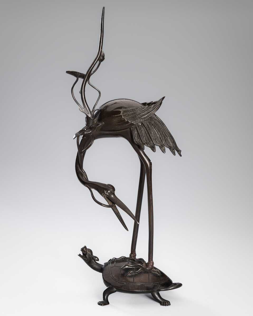 Lot 40 - A BRONZE ‘CRANE AND MINOGAME’ OKIMONO