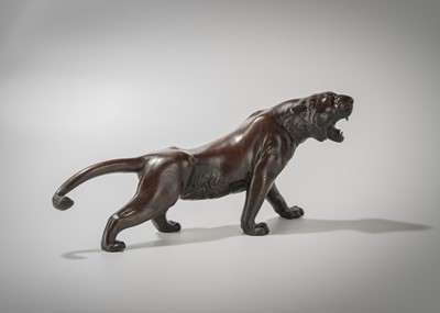 Lot 41 - A PATINATED BRONZE MODEL OF A ROARING TIGER