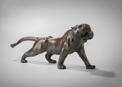 Lot 41 - A PATINATED BRONZE MODEL OF A ROARING TIGER