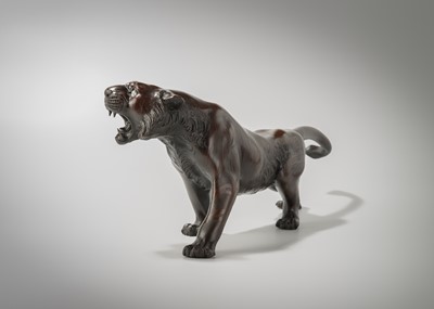 Lot 41 - A PATINATED BRONZE MODEL OF A ROARING TIGER