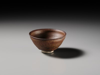 Lot 229 - A JIAN PERSIMMON-GLAZED STONEWARE TEA BOWL, SONG DYNASTY