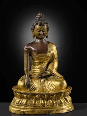 A GILT-BRONZE REPOUSSÉ FIGURE OF BUDDHA SHAKYAMUNI, INNER MONGOLIA, DOLONNOR MONASTERY, 18TH CENTURY