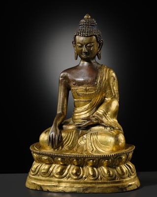 A GILT-BRONZE REPOUSSÉ FIGURE OF BUDDHA SHAKYAMUNI, INNER MONGOLIA, DOLONNOR MONASTERY, 18TH CENTURY