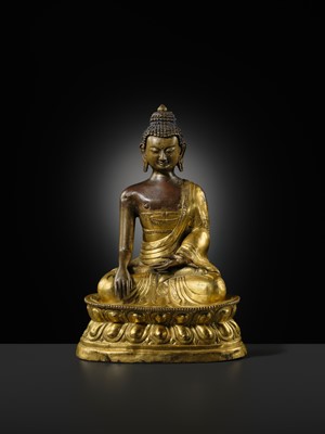 A GILT-BRONZE REPOUSSÉ FIGURE OF BUDDHA SHAKYAMUNI, INNER MONGOLIA, DOLONNOR MONASTERY, 18TH CENTURY