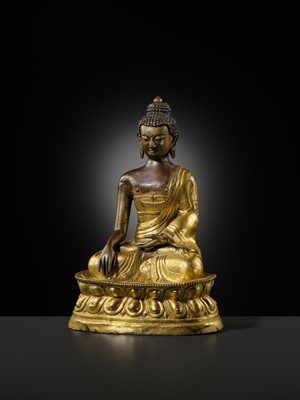 A GILT-BRONZE REPOUSSÉ FIGURE OF BUDDHA SHAKYAMUNI, INNER MONGOLIA, DOLONNOR MONASTERY, 18TH CENTURY