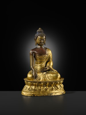 A GILT-BRONZE REPOUSSÉ FIGURE OF BUDDHA SHAKYAMUNI, INNER MONGOLIA, DOLONNOR MONASTERY, 18TH CENTURY