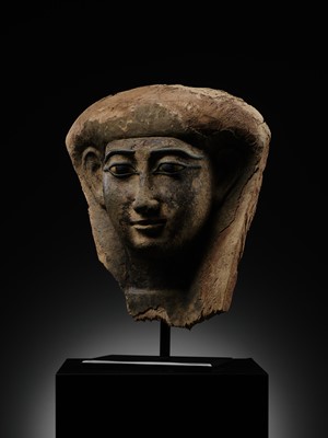 Lot 14 - A BRONZE AND LIMESTONE INLAID WOOD SARCOPHAGUS MASK, PTOLEMAIC PERIOD