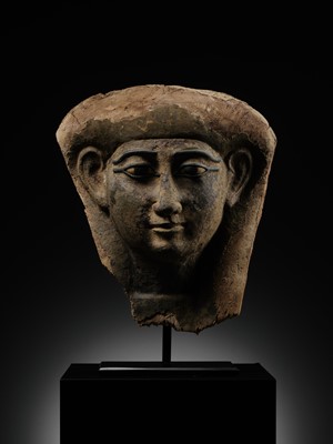 Lot 14 - A BRONZE AND LIMESTONE INLAID WOOD SARCOPHAGUS MASK, PTOLEMAIC PERIOD