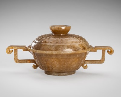 Lot 942 - AN ARCHAISTIC PALE YELLOW AND BROWN JADE CENSER AND LID, MING DYNASTY