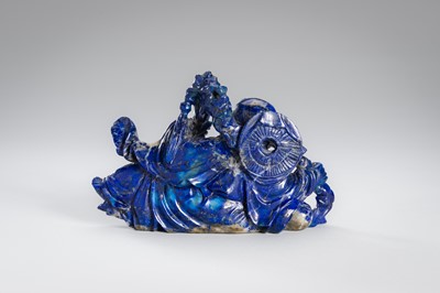 Lot 906 - A LAPIS LAZULI FIGURE OF AN IMMORTAL, c.1900s