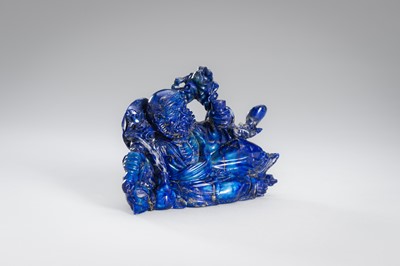 Lot 906 - A LAPIS LAZULI FIGURE OF AN IMMORTAL, c.1900s