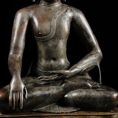 Lot 79 - A LARGE SILVERED BRONZE FIGURE OF BUDDHA SHAKYAMUNI, TIBETO-CHINESE, 15TH CENTURY, POSSIBLY IMPERIAL WORKSHOPS BEIJING