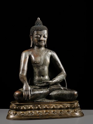 Lot 79 - A LARGE SILVERED BRONZE FIGURE OF BUDDHA SHAKYAMUNI, TIBETO-CHINESE, 15TH CENTURY, POSSIBLY IMPERIAL WORKSHOPS BEIJING