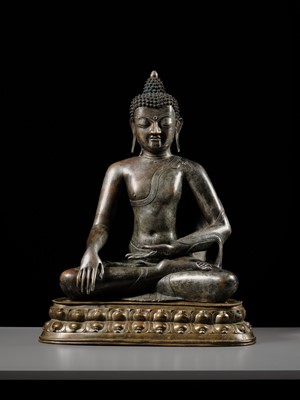 Lot 79 - A LARGE SILVERED BRONZE FIGURE OF BUDDHA SHAKYAMUNI, TIBETO-CHINESE, 15TH CENTURY, POSSIBLY IMPERIAL WORKSHOPS BEIJING