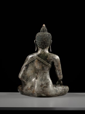 Lot 79 - A LARGE SILVERED BRONZE FIGURE OF BUDDHA SHAKYAMUNI, TIBETO-CHINESE, 15TH CENTURY, POSSIBLY IMPERIAL WORKSHOPS BEIJING