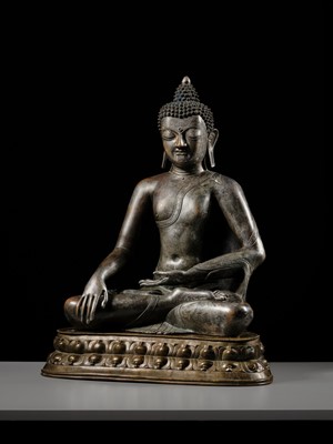 Lot 79 - A LARGE SILVERED BRONZE FIGURE OF BUDDHA SHAKYAMUNI, TIBETO-CHINESE, 15TH CENTURY, POSSIBLY IMPERIAL WORKSHOPS BEIJING