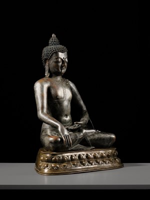 Lot 79 - A LARGE SILVERED BRONZE FIGURE OF BUDDHA SHAKYAMUNI, TIBETO-CHINESE, 15TH CENTURY, POSSIBLY IMPERIAL WORKSHOPS BEIJING