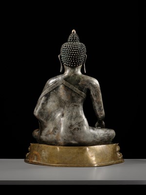 Lot 79 - A LARGE SILVERED BRONZE FIGURE OF BUDDHA SHAKYAMUNI, TIBETO-CHINESE, 15TH CENTURY, POSSIBLY IMPERIAL WORKSHOPS BEIJING