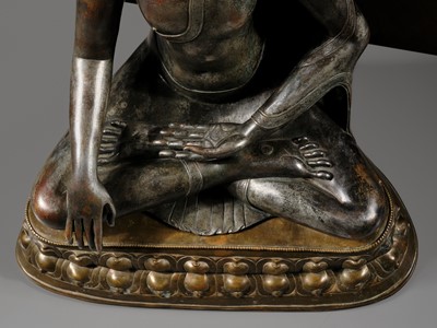 Lot 79 - A LARGE SILVERED BRONZE FIGURE OF BUDDHA SHAKYAMUNI, TIBETO-CHINESE, 15TH CENTURY, POSSIBLY IMPERIAL WORKSHOPS BEIJING