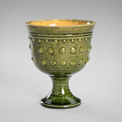 Lot 1243 - A GREEN GLAZED CERAMIC STEM CUP, c. 1950s