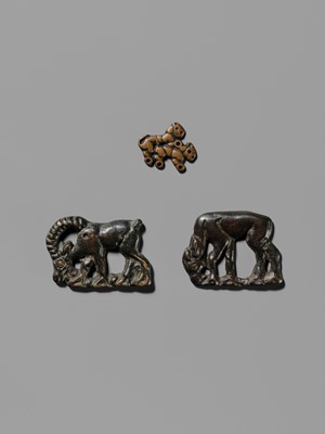 Lot 77 - A GROUP OF THREE ORDOS BRONZE PLAQUES