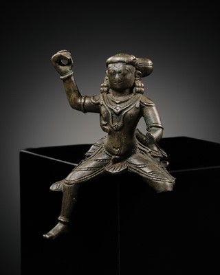 Lot 359 - A BRONZE FIGURE OF A SPIRITED WARRIOR AND YOUNG, INDIA, 18TH CENTURY OR EARLIER