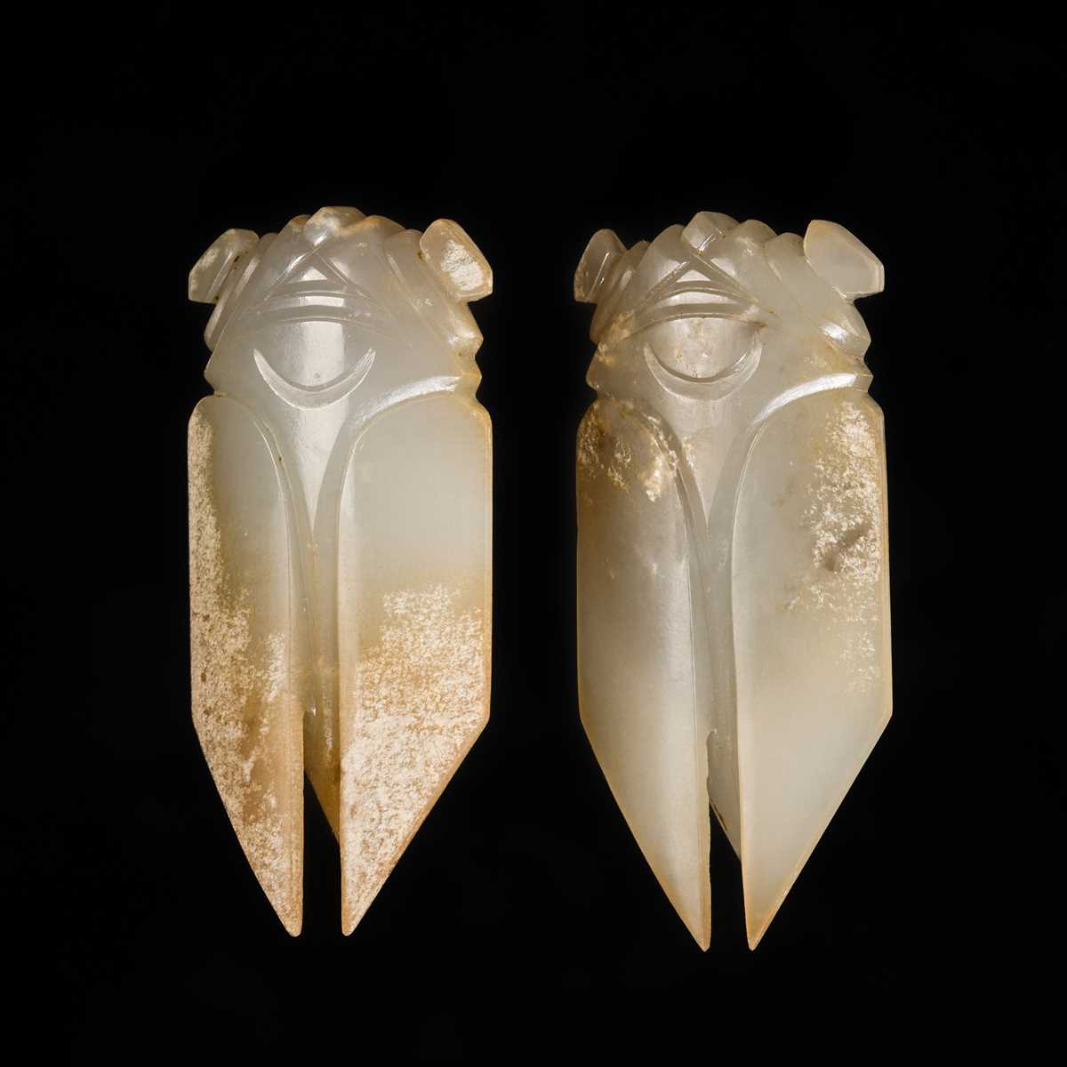 A PAIR OF WHITE JADE ‘CICADA’ FUNERARY TONGUE AMULETS, WESTERN HAN DYNASTY