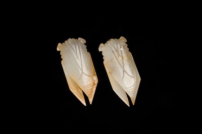 A PAIR OF WHITE JADE ‘CICADA’ FUNERARY TONGUE AMULETS, WESTERN HAN DYNASTY