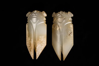 A PAIR OF WHITE JADE ‘CICADA’ FUNERARY TONGUE AMULETS, WESTERN HAN DYNASTY