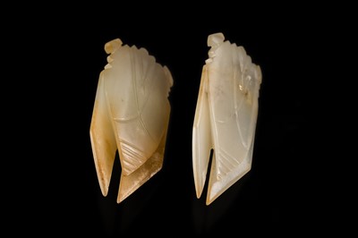 A PAIR OF WHITE JADE ‘CICADA’ FUNERARY TONGUE AMULETS, WESTERN HAN DYNASTY