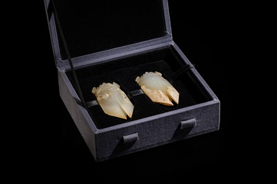 A PAIR OF WHITE JADE ‘CICADA’ FUNERARY TONGUE AMULETS, WESTERN HAN DYNASTY