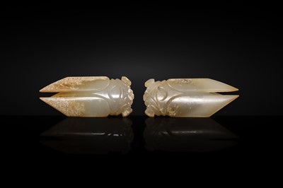 A PAIR OF WHITE JADE ‘CICADA’ FUNERARY TONGUE AMULETS, WESTERN HAN DYNASTY