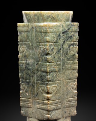 Lot 429 - A MOTTLED GREEN JADE FIVE-TIERED CONG, PROBABLY NEOLITHIC PERIOD, LIANGZHU CULTURE