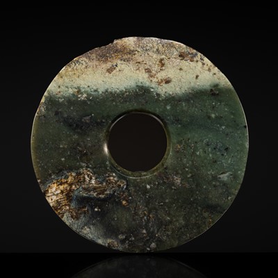 Lot 155 - A RARE AND PARTIALLY ALTERED MOTTLED DARK GREEN JADE DISK, BI, LATE SHANG TO WESTERN ZHOU DYNASTY