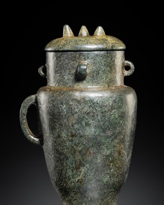 Lot 428 - A DARK GREEN JADE LIDDED URN, PROBABLY NEOLITHIC PERIOD