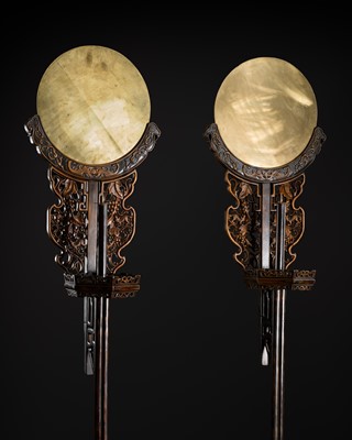 Lot 402 - A RARE PAIR OF NANMU ‘BATS AND SQUIRRELS’ LAMPSTANDS, SANZUDENGTAI, QING DYNASTY